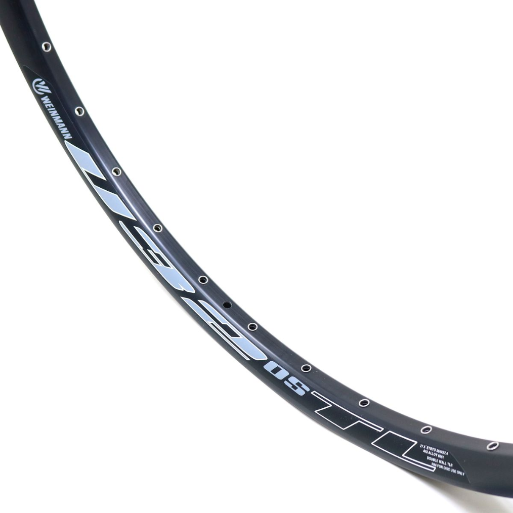 LLANTA WEINMANN U32 TL 27.5 ASIMETRICA OJETILLOS 32H PRESTA NEGRO